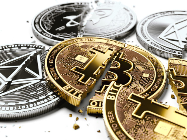 Stack Of Broken Or Cracked Bitcoin And Altcoins Coins Laying On